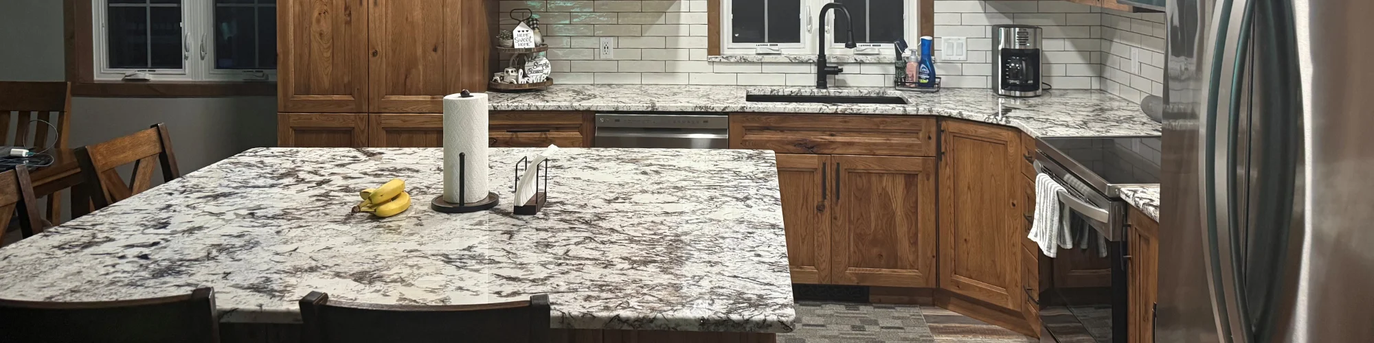 Kitchen with stone counter tops